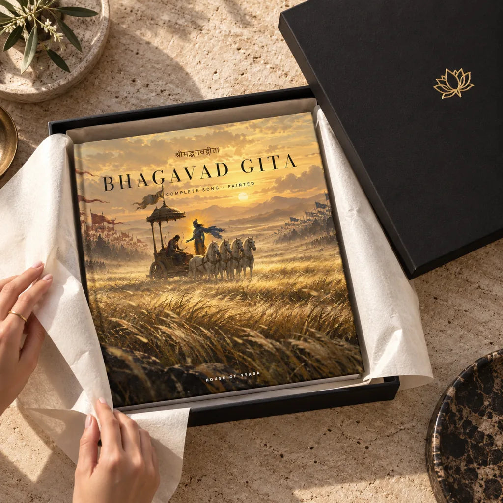The black keepsake box open on a stone table, the book resting in ivory tissue
